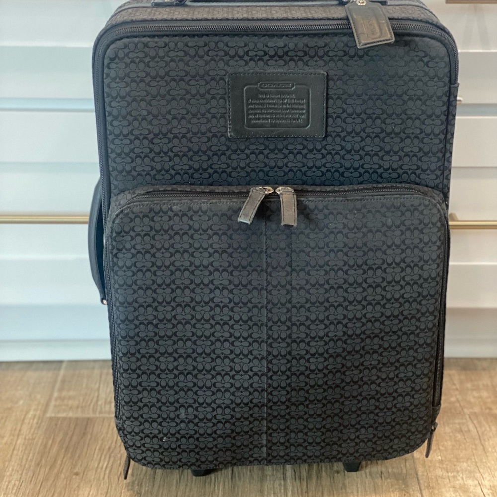 Coach Signature Suitcase. Black, canvas and leather.